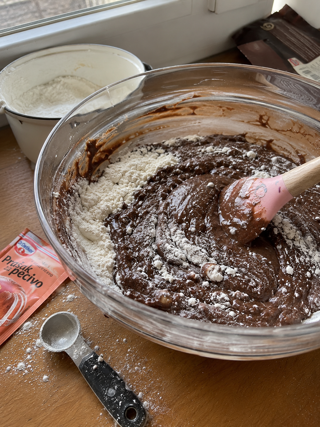 Adding flour and baking powder
