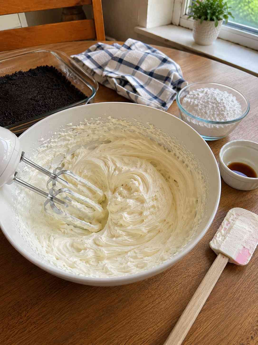 Preparing cream filling for Oreo Fantasy Cake